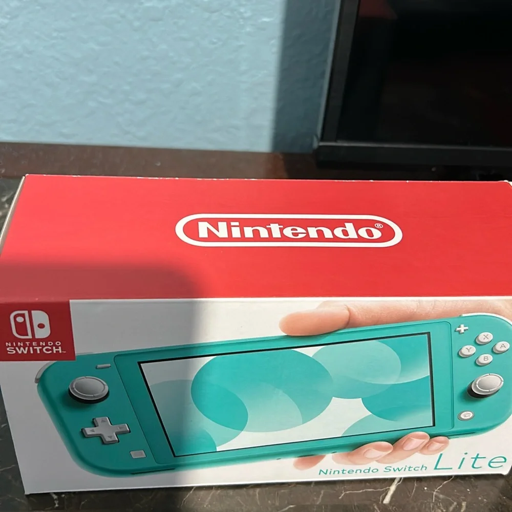 Nintendo Switch Lite Turquoise Handheld Gaming Console - Boxed Display